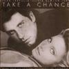 ascolta in linea John Travolta Y Olivia NewtonJohn - Take A Chance